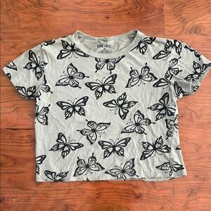On Fire Sage Green Short Sleeve Cropped T-Shirt with Black Butterfly Design